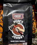Coffee bag from Coffin Creek Coffee Co with a Halloween-themed design on a dark background.