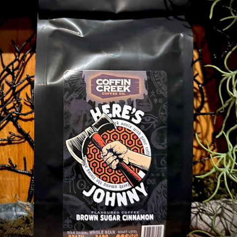 Coffee bag from Coffin Creek Coffee Co with a Halloween-themed design on a dark background.
