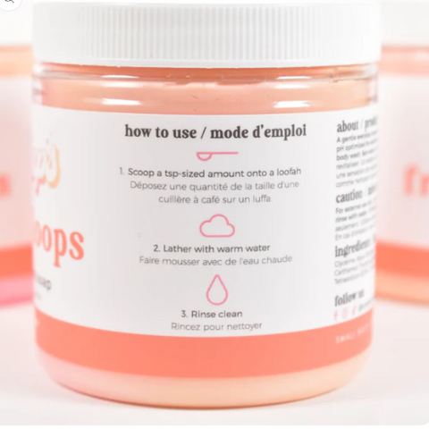 Jar of soap with label showing usage instructions on a white background