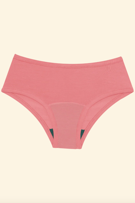 Pink underwear on a beige background