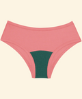 Pink high-waisted bikini bottom with green interior on a beige background