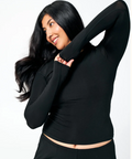 model wearing a black long sleeve huha top