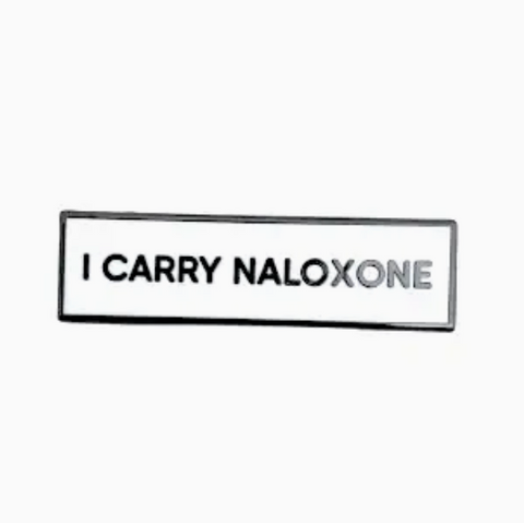 Badge with 'I CARRY NALOXONE' text on a white background