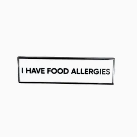 Black rectangular label with 'I HAVE FOOD ALLERGIES' text on a white background