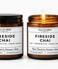 Two amber glass soy candles from Isle of Rose Candle Co. on a white background, one unlit with a black lid and one lit with a warm flame.