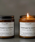 Two candles from Isle of Rose Candles with labels on a dark background