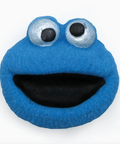Blue character with large eyes and a wide mouth on a white background