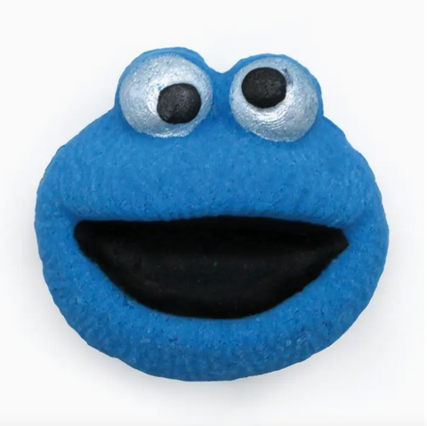 Blue character with large eyes and a wide mouth on a white background