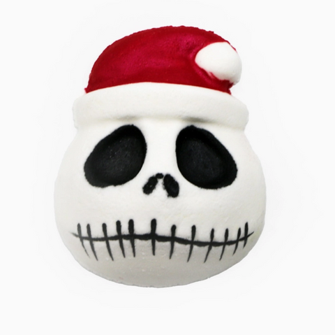 Plush toy with a skull design wearing a red Santa hat on a white background
