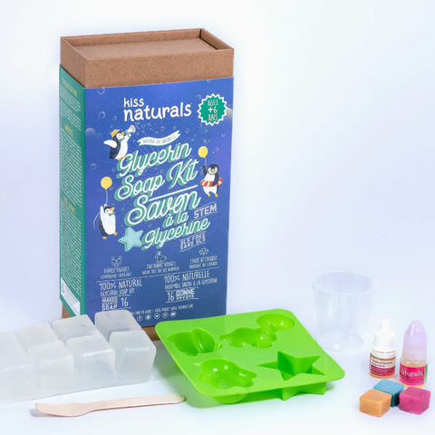 Kiss Naturals glycerin soap kit with packaging, silicone mold, and other components on a white background