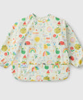 Baby bib with colorful fruit and rainbow pattern on a white background