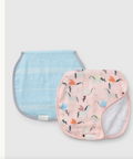 Two baby bibs, one blue with white polka dots and the other pink with colorful patterns, on a light gray background.