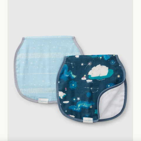 Two baby bibs with space-themed designs on a light gray background