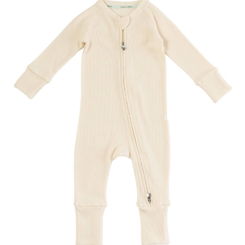 Beige baby onesie with a zipper on a white background