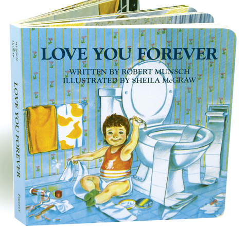 Hardcover children's book titled "Love You Forever" with a colorful illustration of a child sitting on the floor in front of a toilet in a bathroom. The cover shows blue striped wallpaper, a yellow towel, and the title in large dark blue letters.