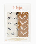 Two baby blankets with patterns in a 'lulujo' packaging on a white background