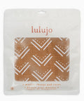 Lulujo muslin change pad cover with geometric pattern in clear packaging