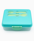 A square light blue-green plastic lunch box with a matching green utensil set inside a clear window on the lid, shown on a plain white background.