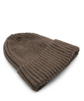 Brown knit beanie on a white background