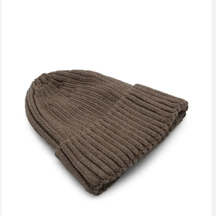 Brown knit beanie on a white background