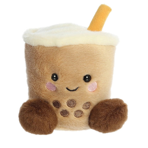 Plush toy resembling a bubble tea cup with a smiling face on a white background