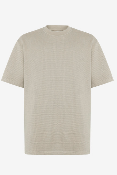 Beige t-shirt on a white background