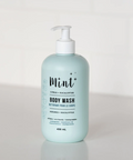 Body wash bottle labeled 'Mint' on a light gray background