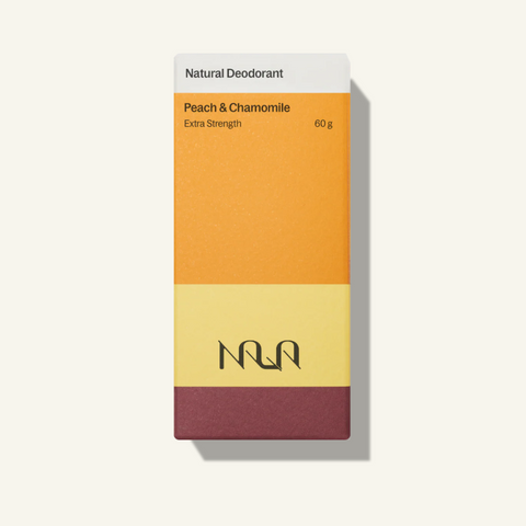 NUA peach and chamomile natural deodorant packaging on a white background
