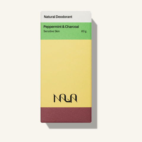 Nila natural deodorant packaging with a yellow and red design on a white background