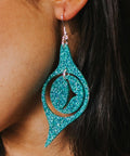 Holographic Teal Octopus Eye - Copper Canoe Woman