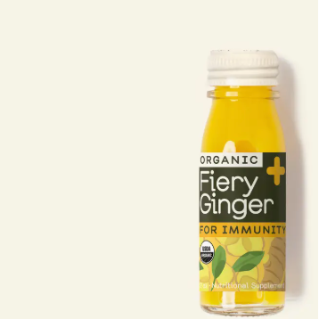 Bottle of Fiery Ginger supplement on a white background