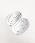 Silver mirror acrylic large ovoid earrings with trigon cutout from Copper Canoe Woman.