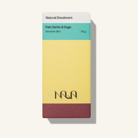Nila natural deodorant packaging with a yellow and red design on a white background