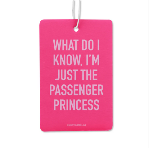 Pink card with white text 'What do I know, I'm just the passenger princess' on a white background