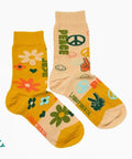 Two pairs of socks with floral and peace sign designs on a white background.