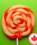 Red and white striped lollipop on a green background with Vollo's Confections logo.
