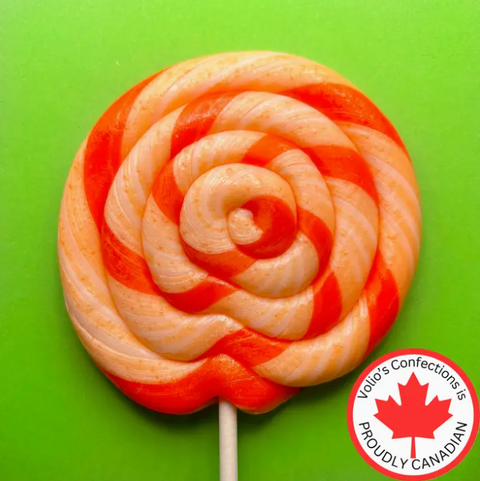 Red and white striped lollipop on a green background with Vollo's Confections logo.