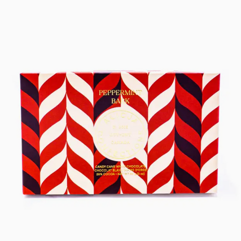 Peppermint Bark packaging with red, white, and black candy cane pattern on a white background