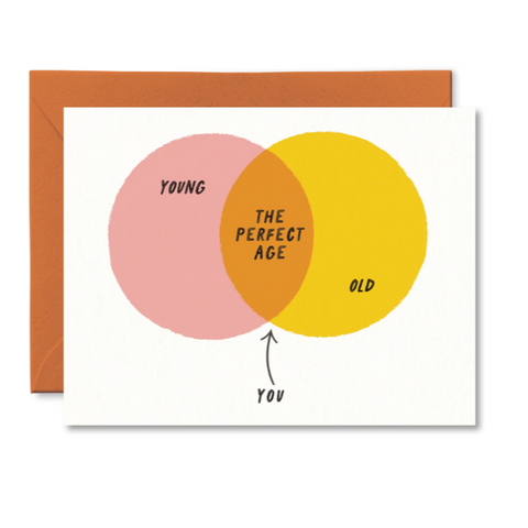 Card with Venn diagram showing 'Young', 'Old', and 'The Perfect Age' with a brown envelope.