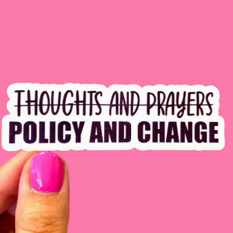 Text 'THOUGHTS AND PRAYERS POLICY AND CHANGE' on a pink background with a hand holding a pink nail.