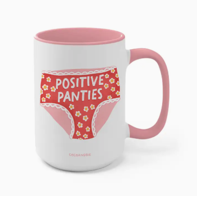 Mug with 'Positive Panties' design on a white background