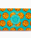 Chocolate chip cookie packaging with teal background and cookie pattern