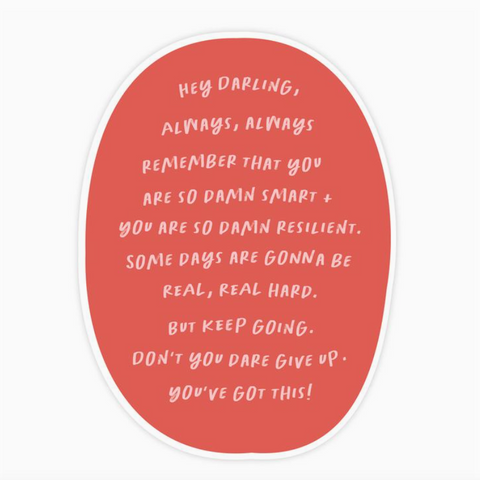 Motivational quote on a pink oval background