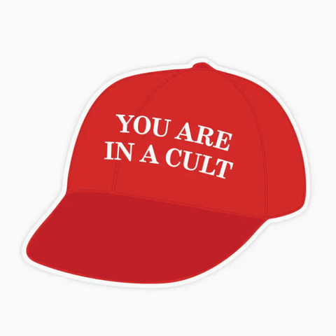 Red cap with white text 'YOU ARE IN A CULT' on a white background