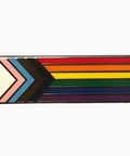 Colorful striped pin with a geometric design on a white background