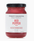 Jar of Provisions Red Pepper Jelly with a black lid on a white background