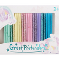 A boxed set of pastel rainbow fabric hair ties labeled 'Great Pretenders' with unicorn illustrations on the packaging, shown against a plain white background.
