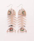 A pair of Medium Salmon Ghost earrings in rose gold mirror acrylic from Copper Canoe Woman.