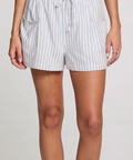 Striped shorts worn by a person on a plain background
