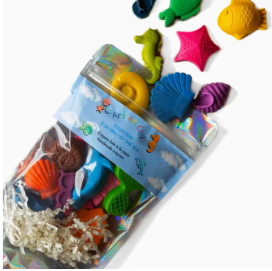 Set of colorful sea-themed bath toys with packaging on a white background